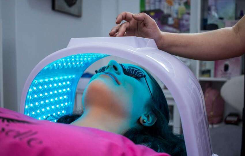 Person with light therapy device