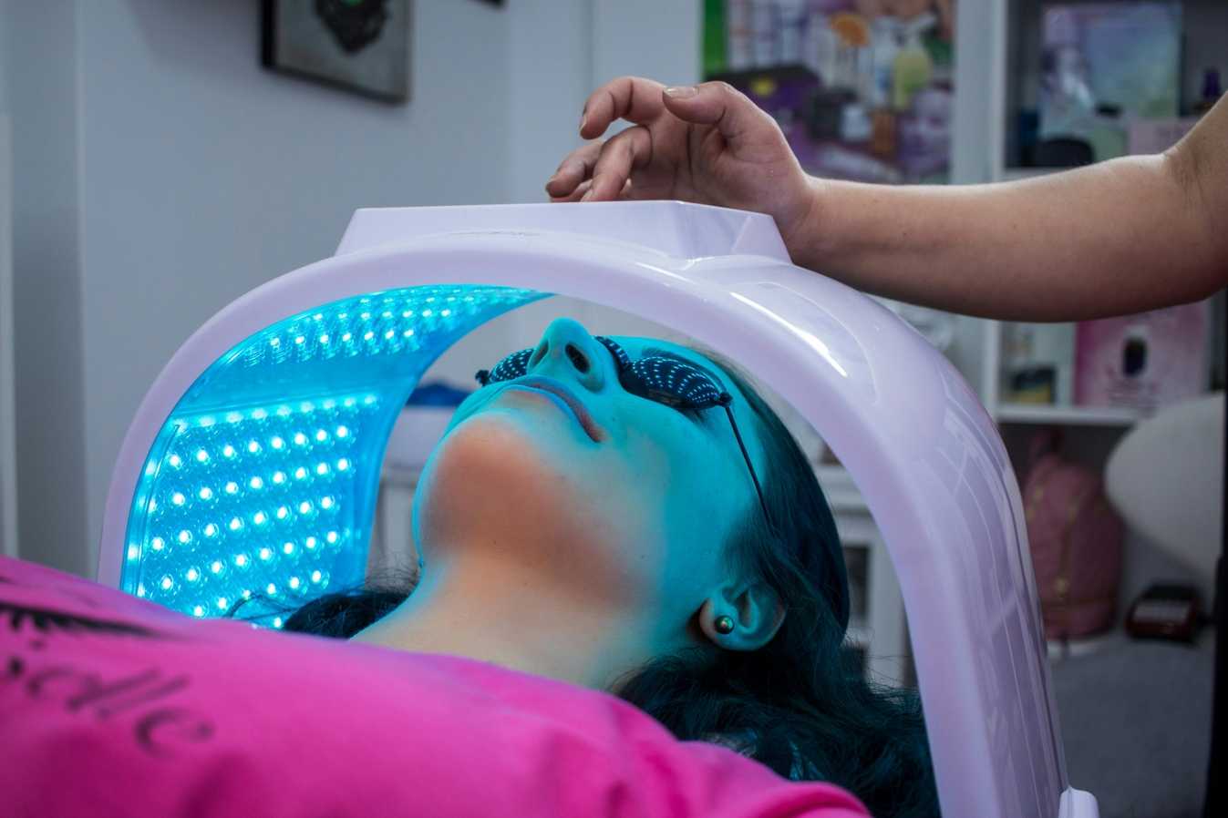 Person with light therapy device